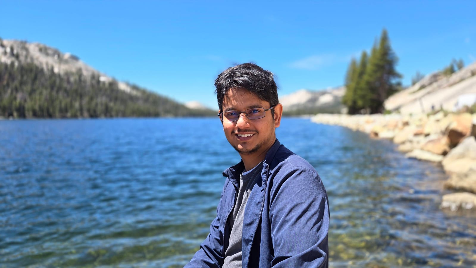 Portrait beside a mountain lake